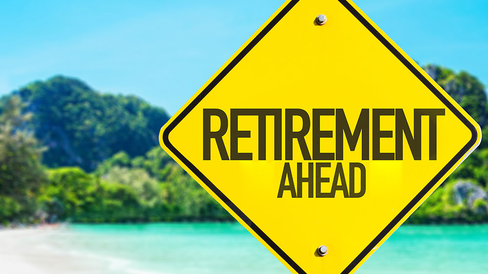 sign with "retirement ahead" written on it